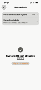 Widok okna aktualizacji systemu z informacją, że system iOS 26.0 jest aktualny.